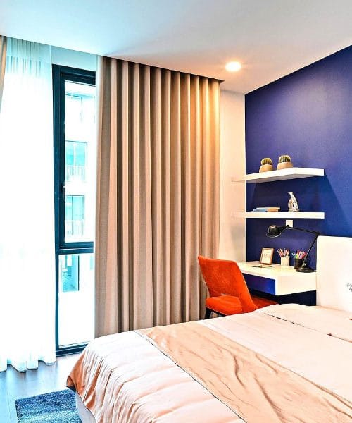 Barve, ki spremenijo spalnico: izbire, ki pomirijo, ogrejejo in obnovijo dom